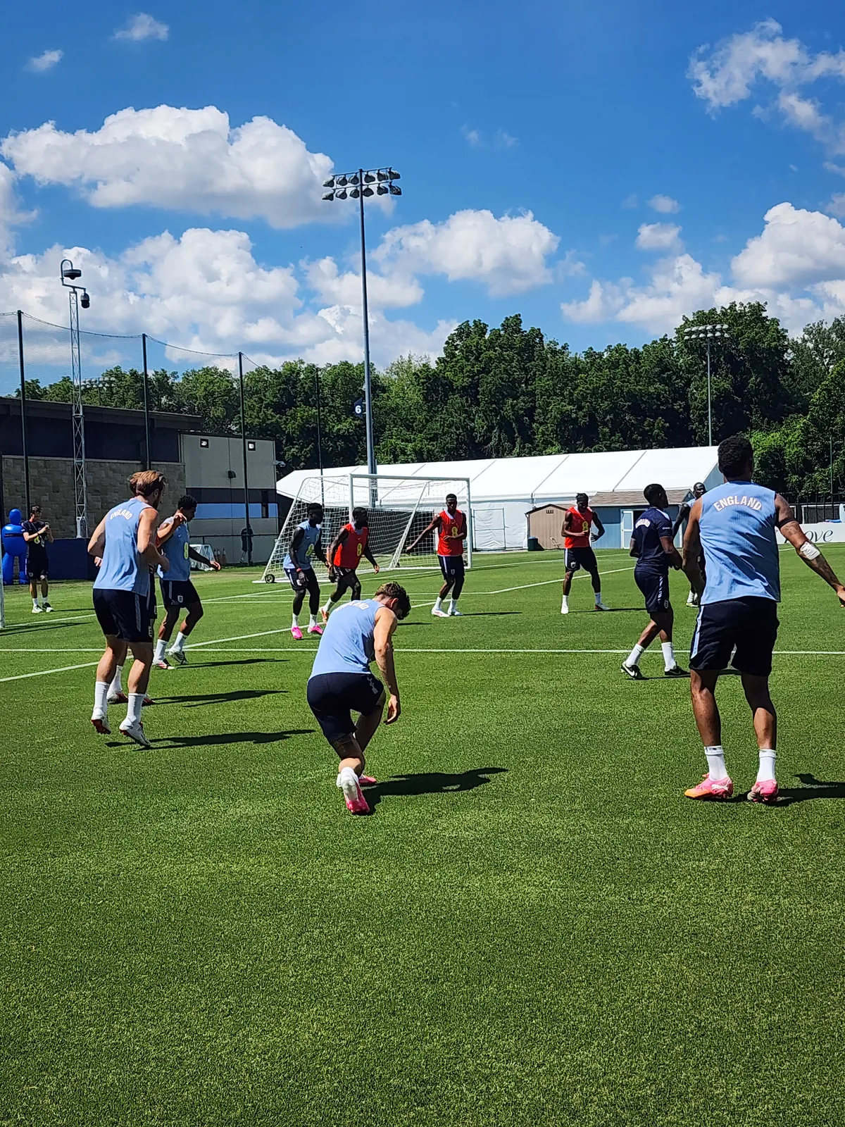 Players training under a Kansas City sky