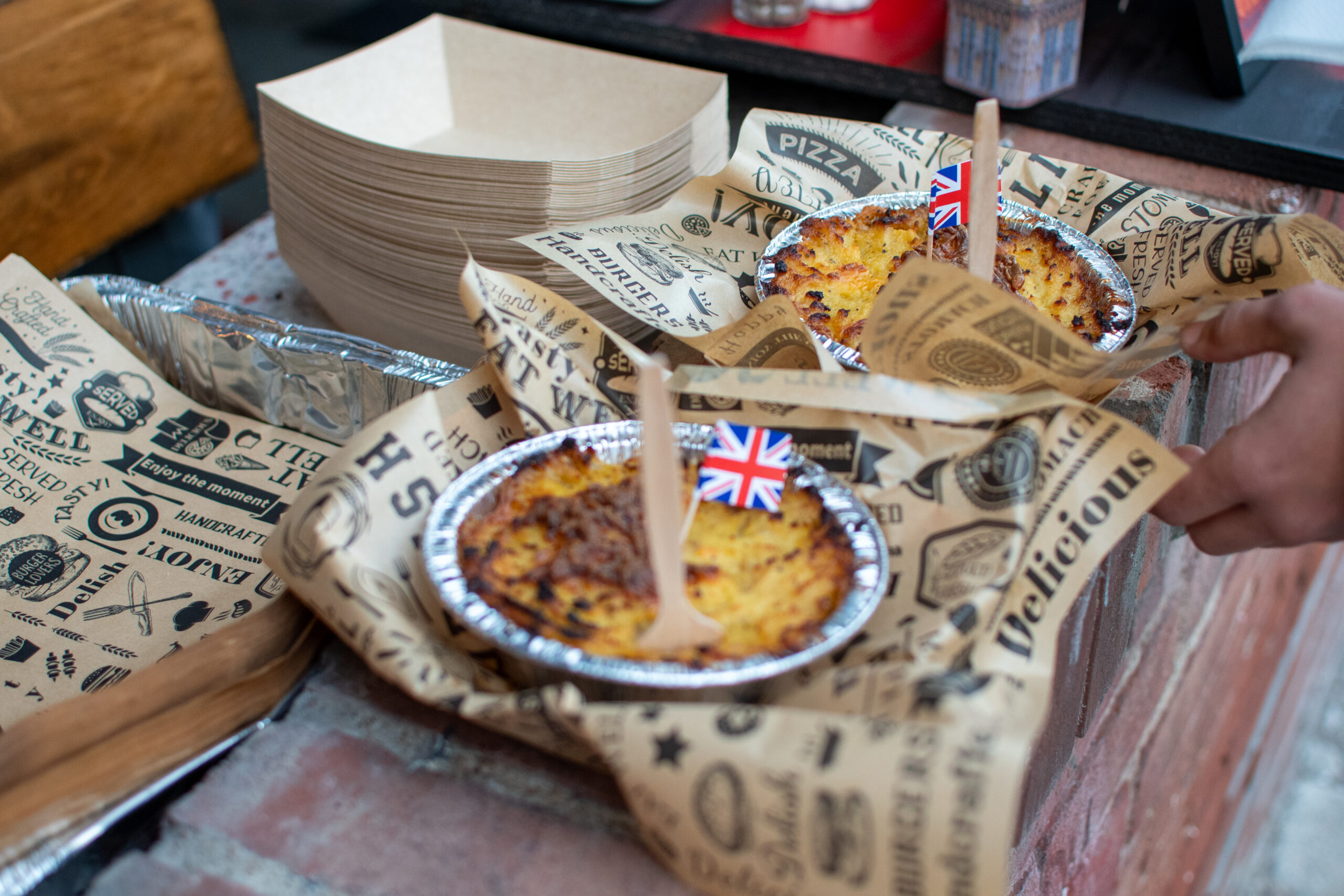 Brit Boy Street Food Pies cooked and served for a customer at a pop up in Kanas City