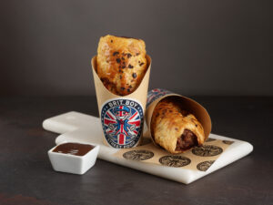 Spicy Sausage Rolls with some HP Sauce packed ready to be served